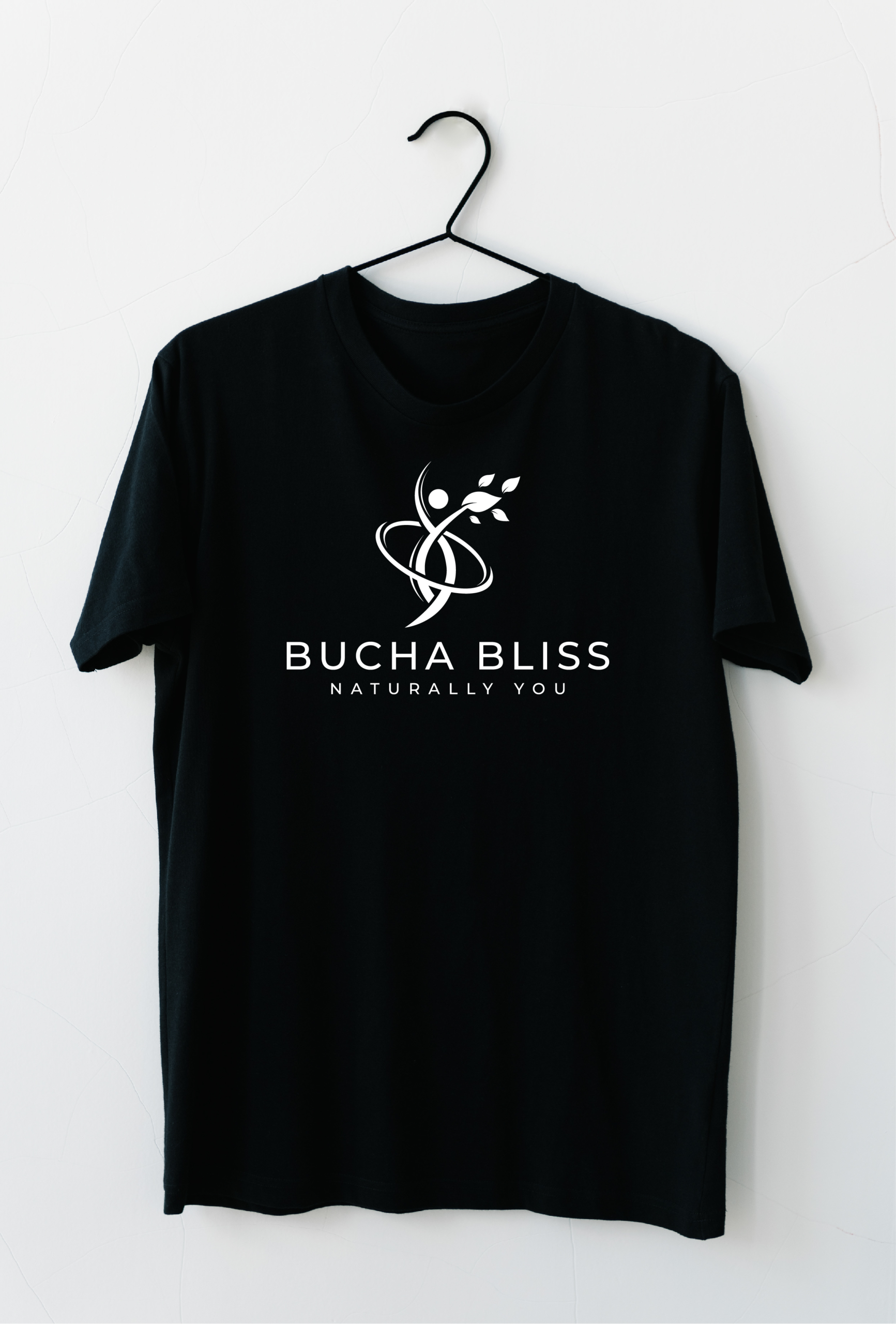 Bucha Bliss T-shirt concept Bucha Bliss botanical logo shown on a black T-shirt mockup.